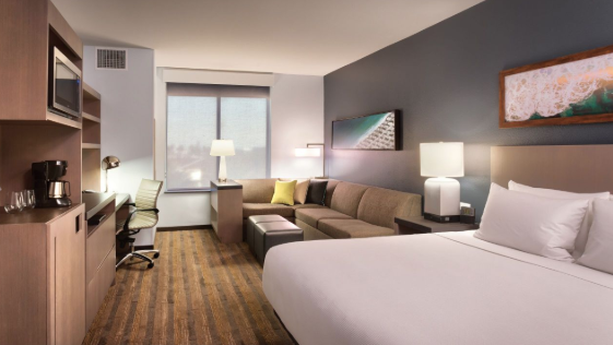 Hyatt House hotel room in Anaheim Resort area near Disneyland. Includes a king size bed and sleeper sofa