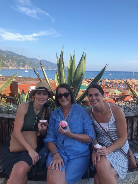 Three women with gelato in Monterosso, Italy on a girls trip