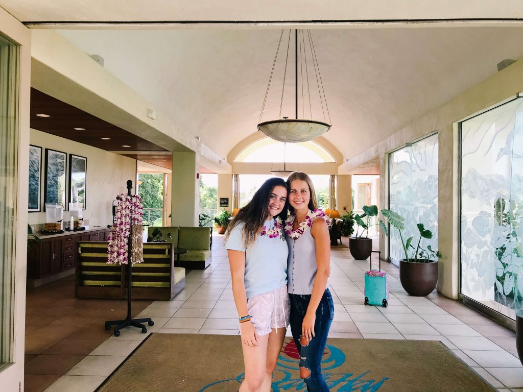 Two girls in lobby of Hawaiian resort