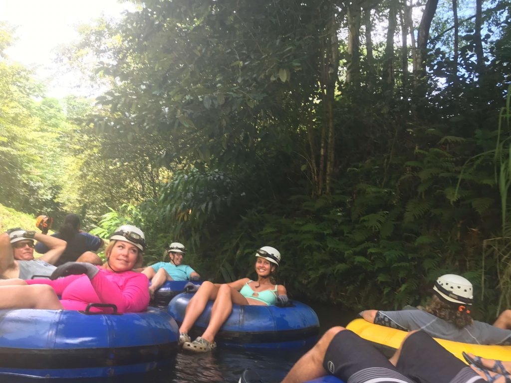 People tubing in canal