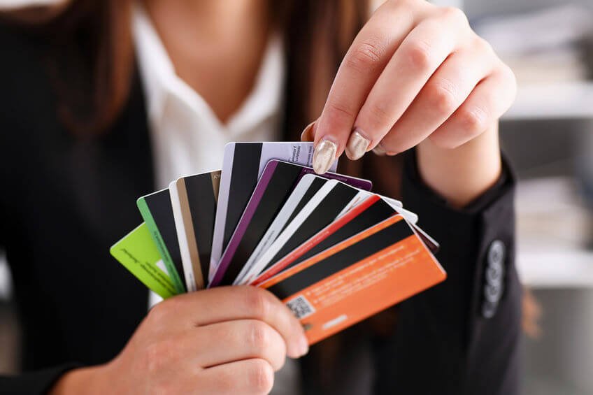 Woman holding credit cards