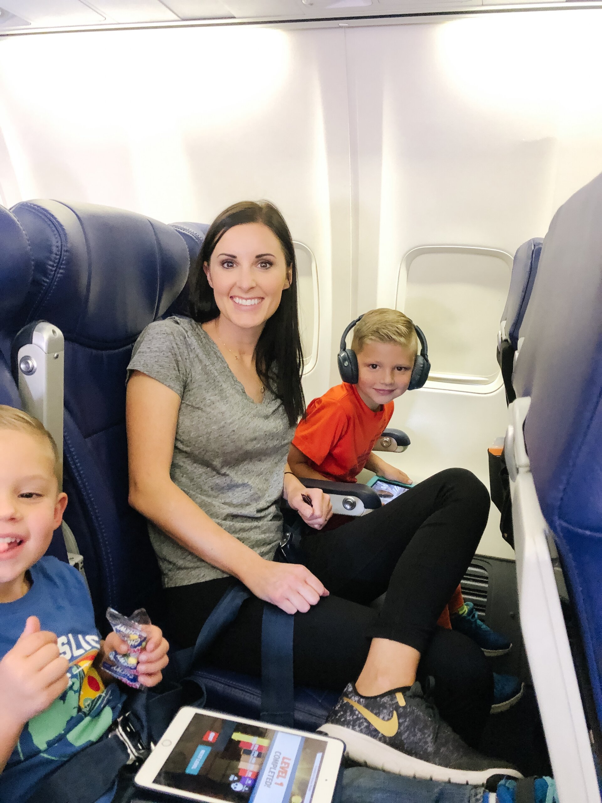 mother with kids on southwest flight