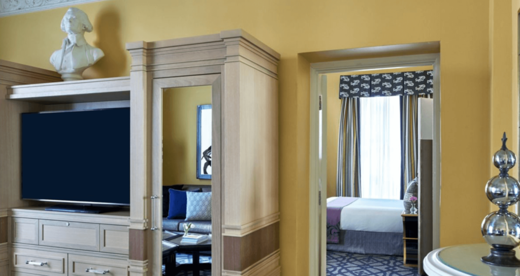 Suite in hotel with yellow walls