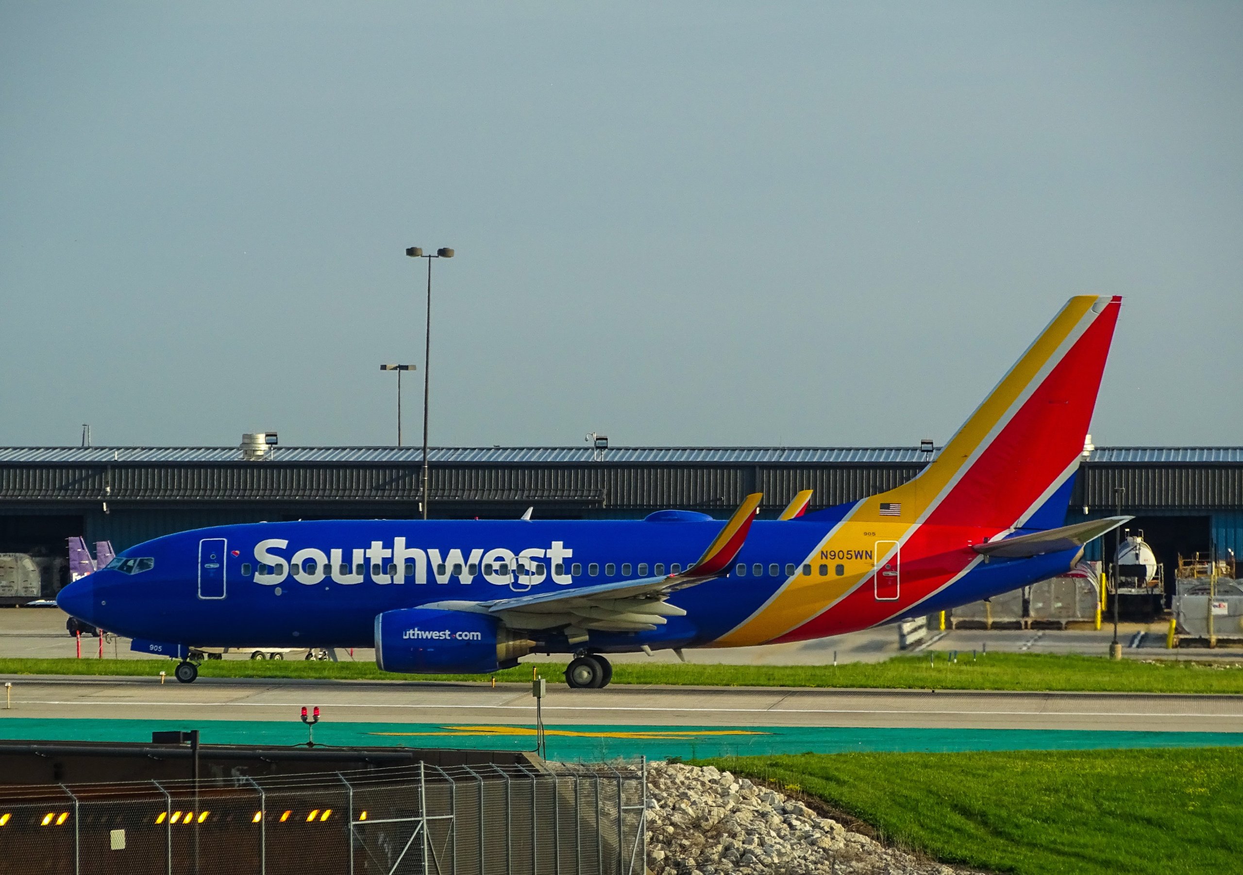 Blue, yellow, and red airplane