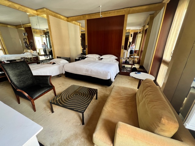 Hotel room with white bed