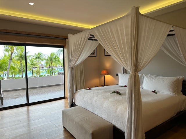 Hotel king bed with resort view