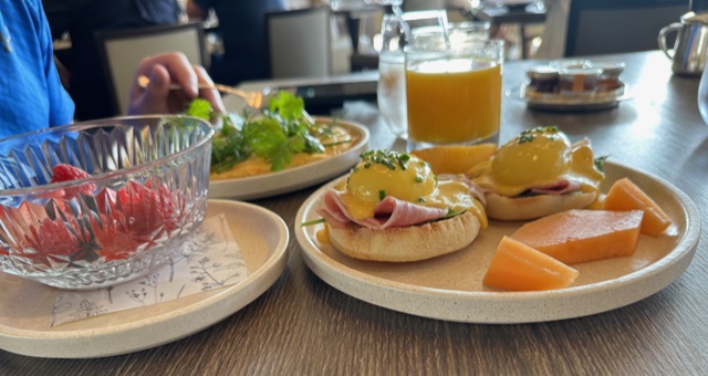 Eggs on muffin with fruit