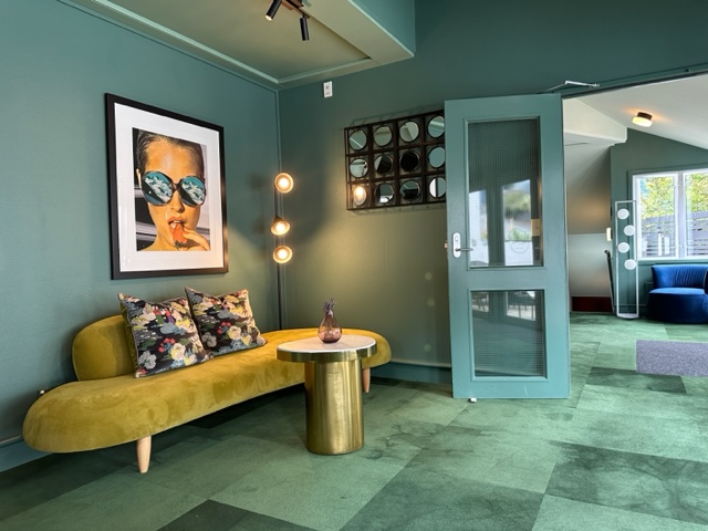 Green reception area of hotel