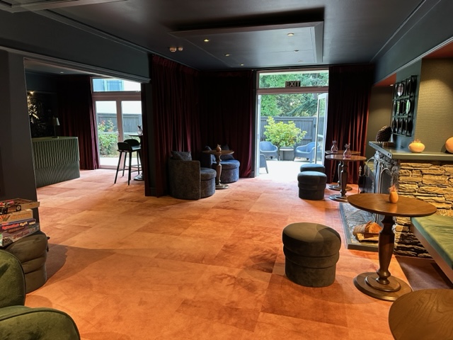 Green lounge area of hotel