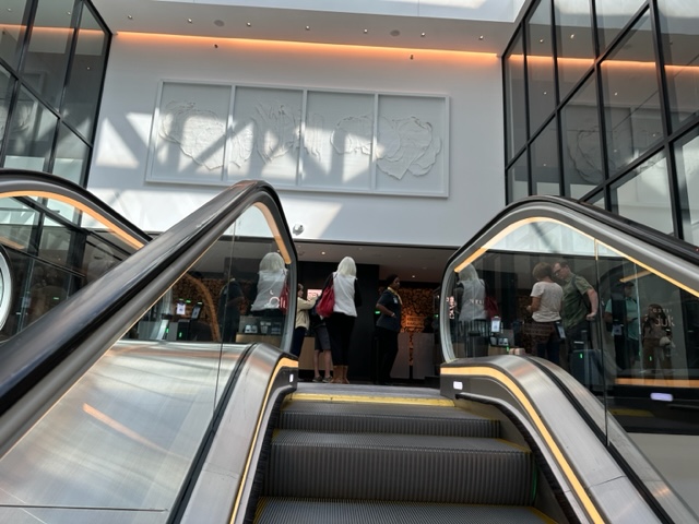 Escalators going up to airport lounge
